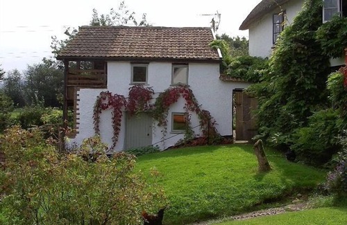 Ottery St Mary House | Converted Barn On Thatched Devon Longhouse Grounds At The Foot Of Rolling Hills.