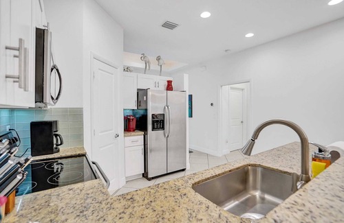 South Corals House | Coral Reef Villa – 3BR/2BA with Heated Pool, Grill & Private Patio