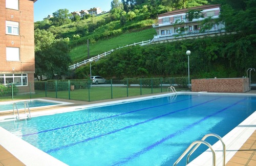 Suances Apartment | Cosy and comfortable flat with swimming pool and paddle tennis court.