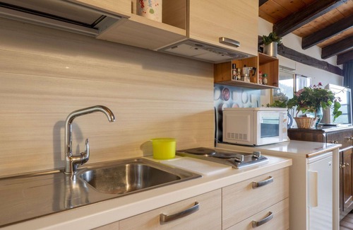 Vito d'Asio Apartment | Cosy apartment for 2 people with WIFI, A/C, pool, TV, patio and pets allowed