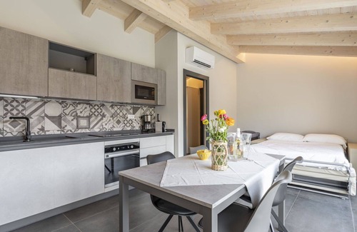Caramagna Ligure Apartment | Cosy apartment for 4 guests with WIFI, A/C, pool, TV and terrace