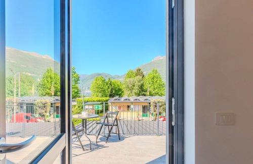 Dervio Apartment | Cosy apartment for 4 guests with WIFI, A/C, pool, TV, patio and panoramic view