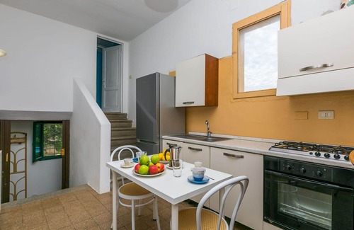 Follonica Villa | Cosy apartment in villa for 6 people with pool, WIFI, TV, patio and pets allowed