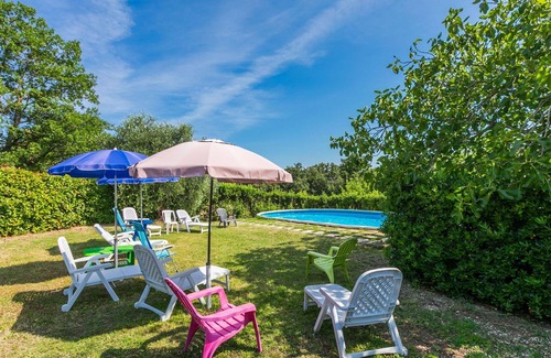 Follonica Villa | Cosy apartment in villa for 6 people with pool, WIFI, TV, patio and pets allowed