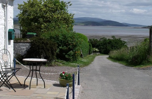 Sandyhills Cottage | Cosy cottage in spectacular location overlooking Balcary Bay