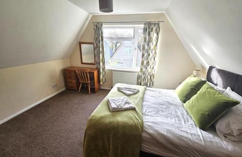 St. Ann's Chapel House | Cosy detached lodge, dog & child friendly with shared pools