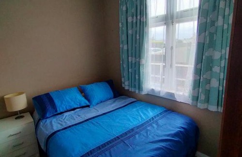 Otaki Beach House | Cosy Kiwi bach Kid and Pet friendly Beach house