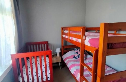 Otaki Beach House | Cosy Kiwi bach Kid and Pet friendly Beach house