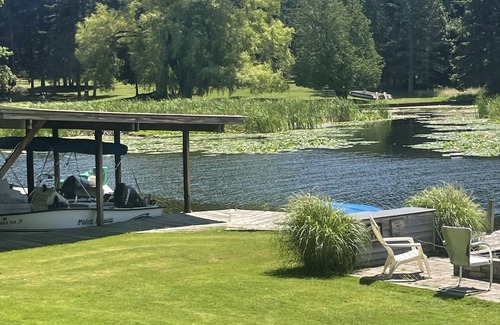 Ludington Cottage | Cottage 2 is a 2 bedroom 25’ from its boat dock & Hamlin Lake