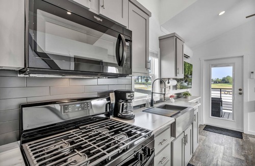 Brenham Cottage | Cottage with Bunk Beds - Includes 1 queen bed in the master, 2 bunk beds and 1 queen bed in the loft. A fully equipped kitchen, dining area, private bath and shower, TVs, Wifi, all utilities, access to all resort amenities. This cottage is pet friend