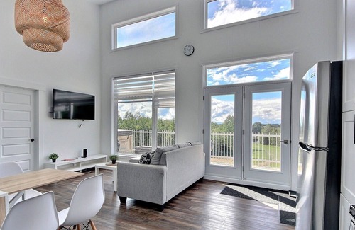 Alma Ski Chalet | Cottages with private SPA / Waterfront / Lac-St-Jean