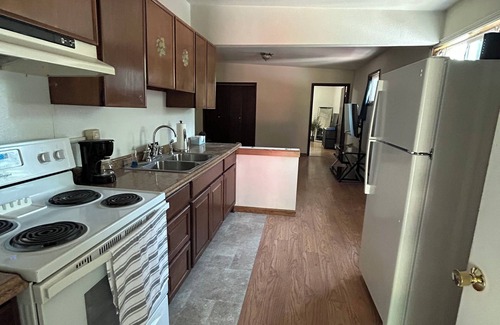 College Apartment | Cozy 1 bedroom apartment across from the airport with WiFi.