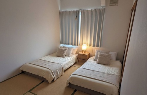 Kutchan Bed & Breakfast | Cozy 2 Bed 1 Bath condo unit - Volcano Views & 12min drive to resort