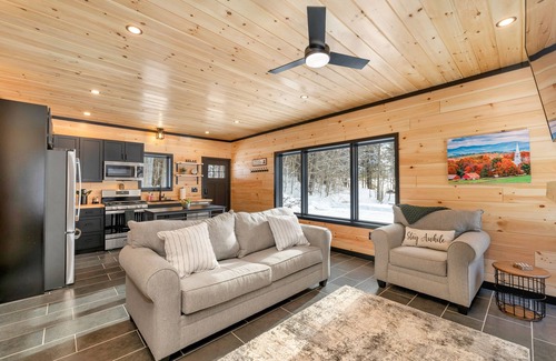Norwich House | Cozy 2BR/1BA cabin for 6. Fireplace, outdoor fire pit, hot tub, and soaking tub.