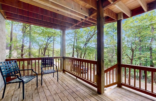Flat Hollow Marina House | Cozy A-frame home with fire pit, deck, pickleball court, and covered boat slip