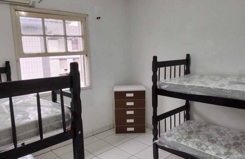 Canto do Forte Apartment | Cozy apartment with Wi-Fi and air conditioning in the bedroom,