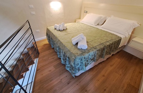 Belmonte Calabro Bed & Breakfast | Cozy B&B room on two levels ideal for 2 or 3 people