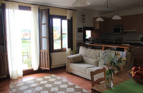 Nueva Apartment | Cozy basement with terrace and views