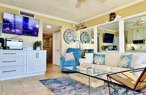 Belleair Beach Condo | Cozy Beachfront Retreat right on the Sand, Sparkling Pool, & Charming Coastal Flair!