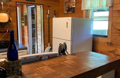 Turin Cabin | Cozy Cabin Sleeps 8 on ATV Trail in Turin NY