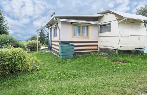 Weiler-Simmerberg RV Rental | Cozy Caravan “Camping Stellplatz Nr. 43” with Mountain View, Garden Area & WiFi; Parking Available