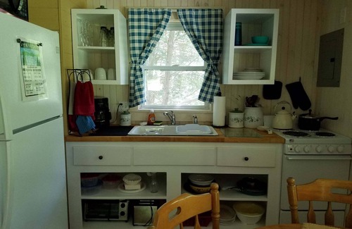 Barton Cottage | Cozy Cottage, Dog Friendly, Close to beach, Natural Wood, Waterfall on site