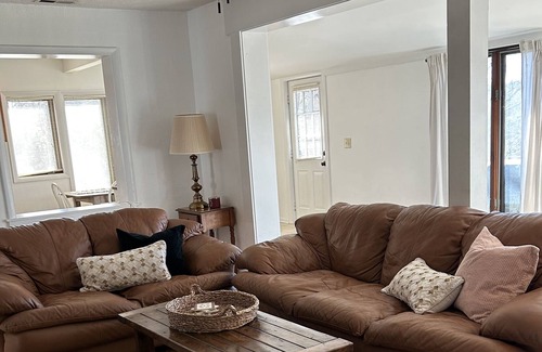 Hood Cottage | Cozy cottage tucked away in the woods with river+ mountain views- pet friendly!
