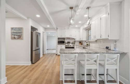 Southmont House | Cozy Cove-Lakefront home with kayaks, paddle board, lillypad, arcade, & fire pit