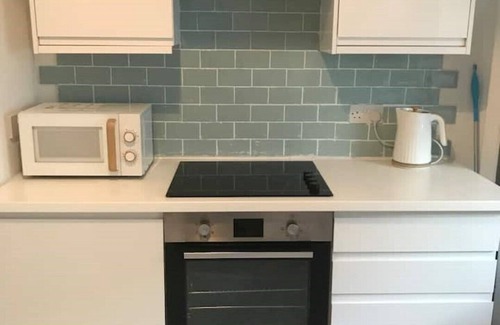 Millport Apartment | Cozy corner ground floor flat close to the sea! 5 night minimum stay July/August