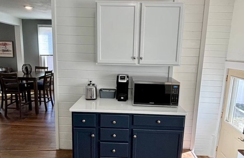 Sioux Falls House | Cozy home near Premier Center, Downtown & Sanford: 65"TV & Fenced Yard-Sleeps 7