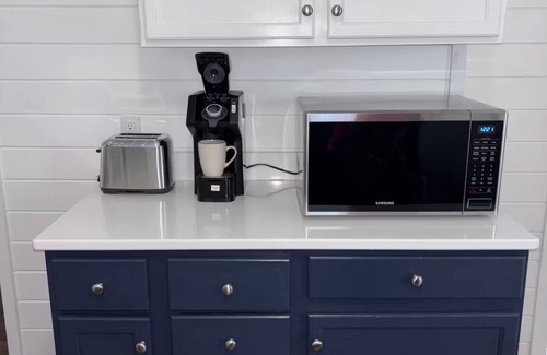 Sioux Falls House | Cozy home near Premier Center, Downtown & Sanford: 65"TV & Fenced Yard-Sleeps 7