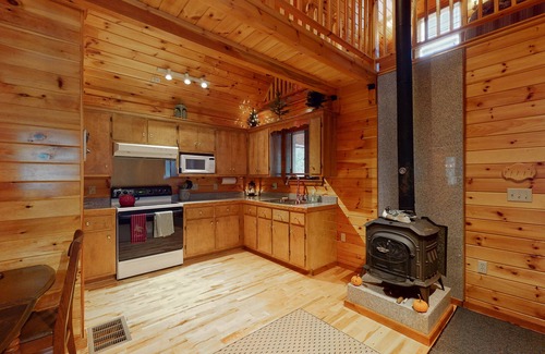 Greenville House | Cozy lakefront home on Sandy Bay w/common beach, boat mooring & gas grill