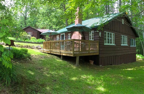 Bristol Cottage | Cozy, lodge-style cottage in wooded, quiet lakeside neighborhood