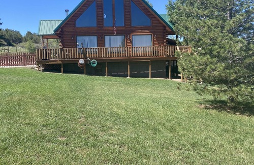 Collbran House | Cozy, Quiet Small Town Log Home. With Beautiful Mountain View.