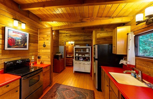 Brightwood Cabin | Cozy riverfront cabin with wood-burning fireplace, lovely deck, and washer/dryer