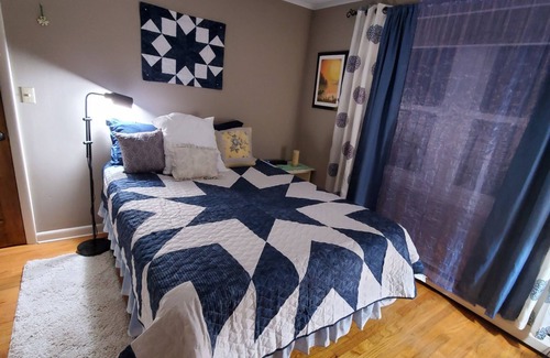 Litchfield House | Cozy room inside a country cottage style home, with a shared bathroom