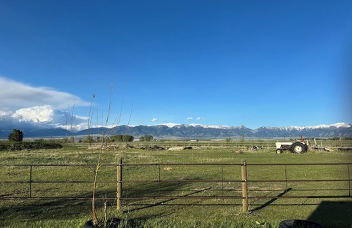 Belgrade Cabin | Cozy, rustic, country cabin with magnificent views of the Bridger Mountains.