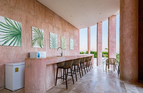 Miramar Apartment | Cozy seaside retreat with shared pool, gym, and stunning views