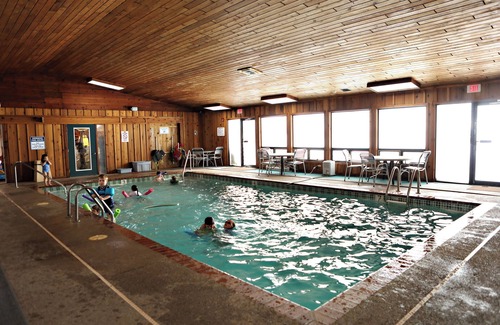 Puposky Apartment | Cozy Studio Poolside Suite - Resort Fun at Your Doorstep