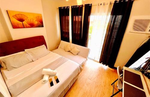 Cagayan de Oro Apartment | Cozy Studio with Balcony in Mesaverte near SM Downtown 4pax max with Free Pool & Netflix