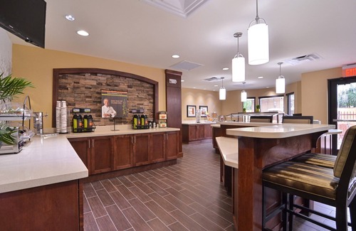 Tomball Condo | Cozy Suite in Tomball | Business Center On-Site + Free Breakfast!