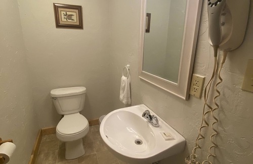 Stahlstown Hotel | Cozy suite with fireplace. Close to hiking trails, ski resorts and family parks!