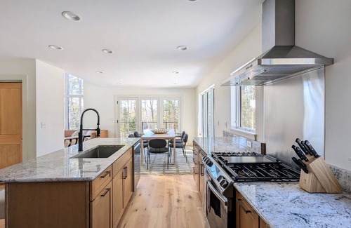 Bethel Ski Chalet | Cozy, sun filled mountain retreat w/45 private acres, hot tub, gym, car charger!