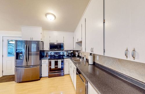 Pierce County House | Cozy tree-lined home with patio, grill, washer/dryer, and internet - near hiking