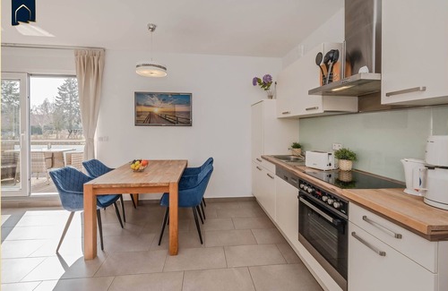 Korswandt Apartment | Cozy vacation apartment in Korswandt on the lake with balcony and lake view
