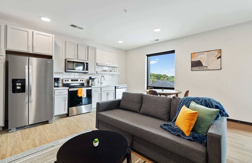Lockerbie Square Apartment | CozySuites Mass with parking, lounge and roof deck 21