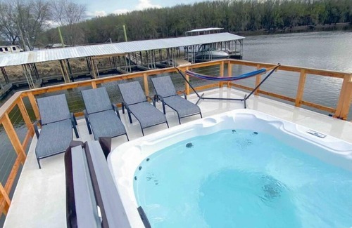 East Dubuque Cabin | Custom Floating Cabin on Mississippi River backwater with a HOT TUB!