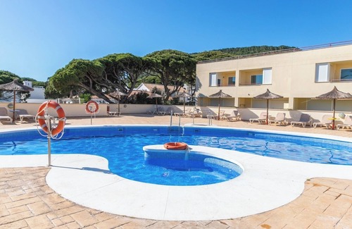Los Canos de Meca Apartment | Dúplex con piscina, garaje y jardín, frente a la playa de los Caños de Meca.