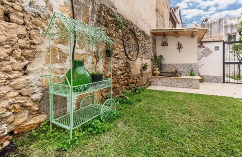 Palermo Apartment | DAMA appartamento per tre persone con tutti i comfort e giardino privato
