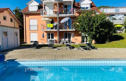 Ludwigshafen Apartment | Das Schneckenhaus - Ferienwohnung mit Pool & Seeblick